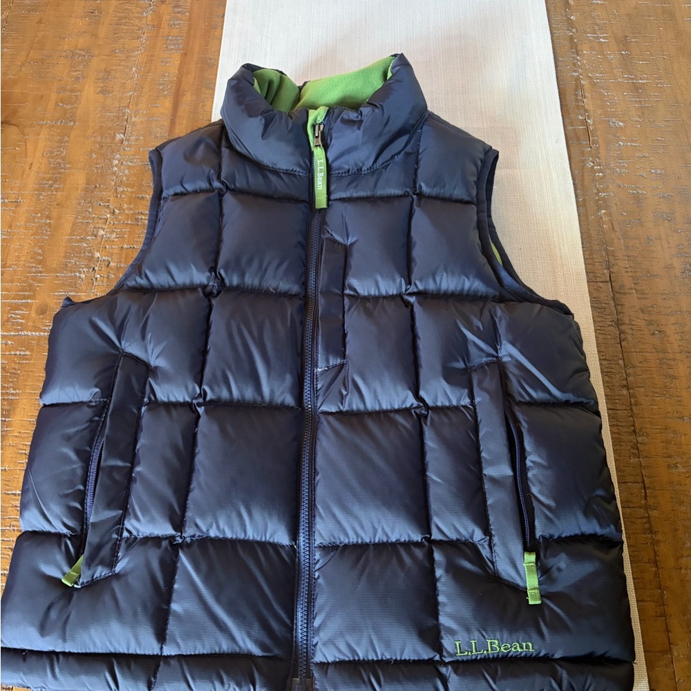 L.L. Bean Kids Navy Puffer Vest with Green inside.